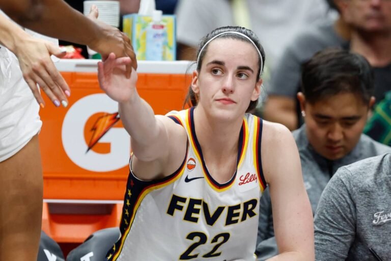 indiana-fever-guard-caitlin-clark-22-reacts-on-the-bench-during-a-wnba-game